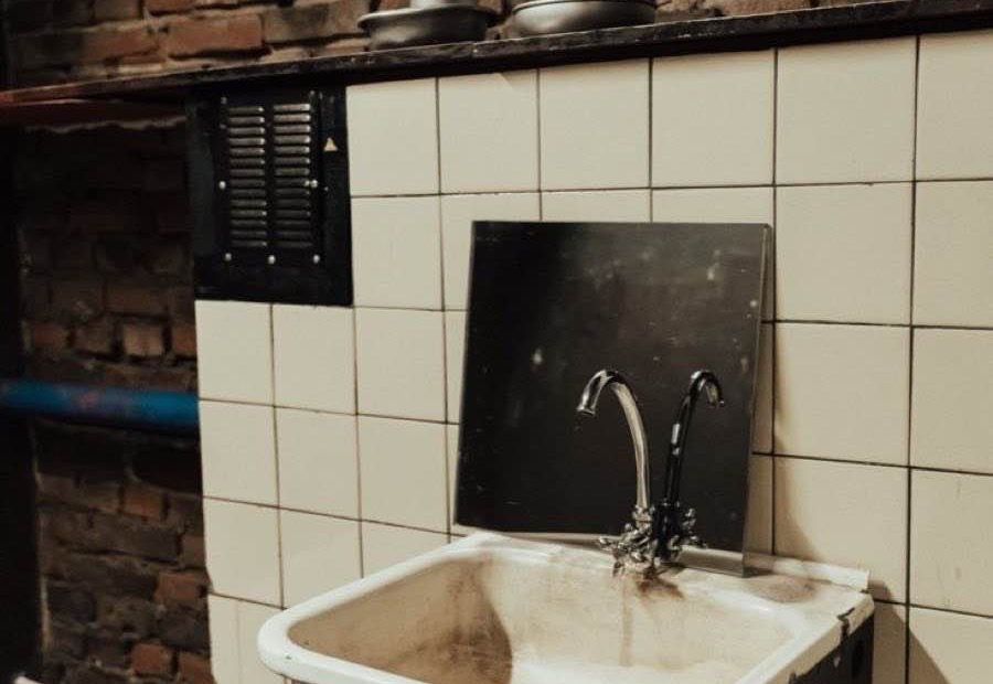 Aging utility sink and drain plumbing